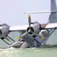 Illustration for article titled Vintage Catalina Flying Boat In Nic Cage Film Partially Sinks On Beach